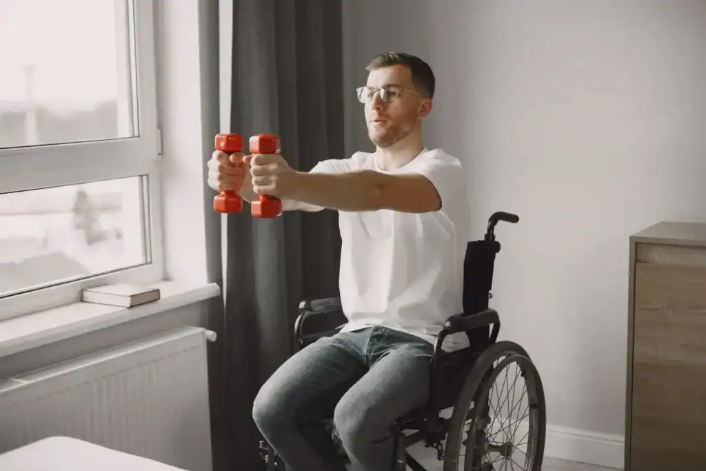 Image of man doing exercise in his wheelchair to aid weight loss West Malling
