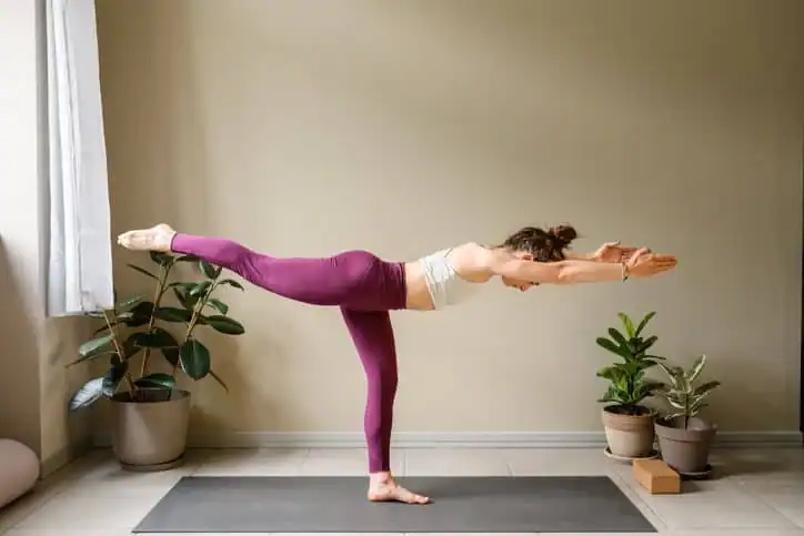 Achieving the Perfect Tone: How Often Should You Exercise for Results? 1 Woman doing Yoga exercise West Malling to help with toning the body.