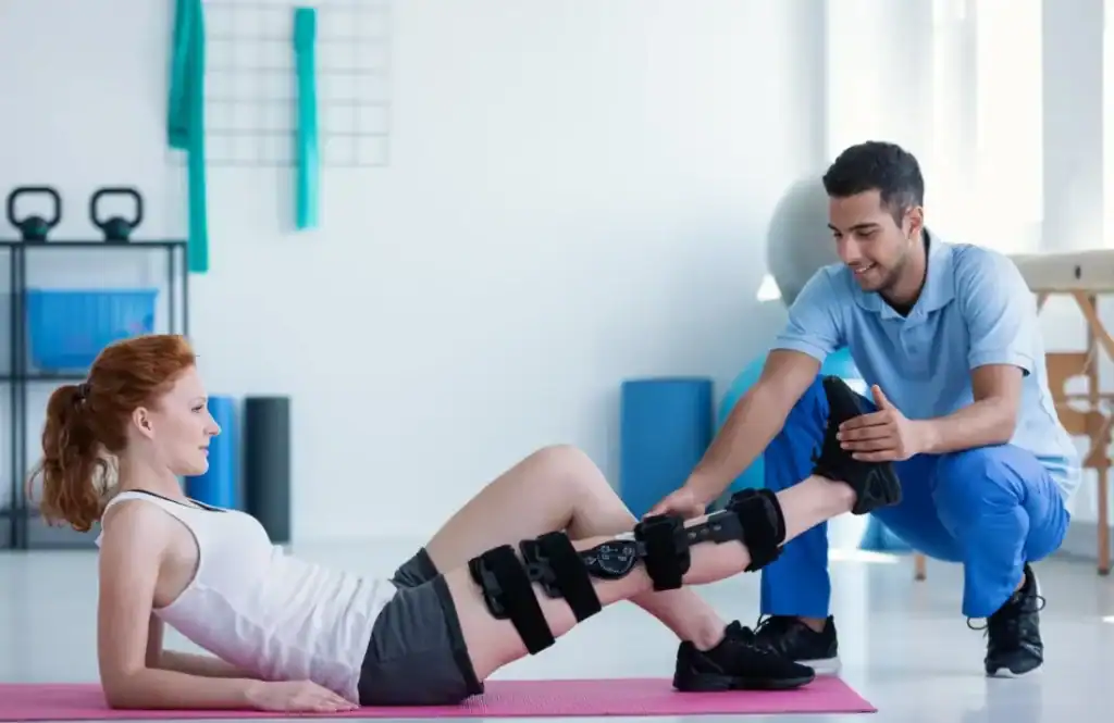 Debunking Meal Timing Myths: The Truth About Muscle Recovery 1 Woman having treatment to help muscle recovery West Malling after an injury