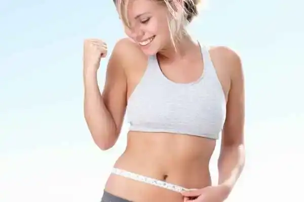 Unraveling the Mystery: Where Does the Body Fat Loss From First? 3 Image of woman happy with fat loss West Malling